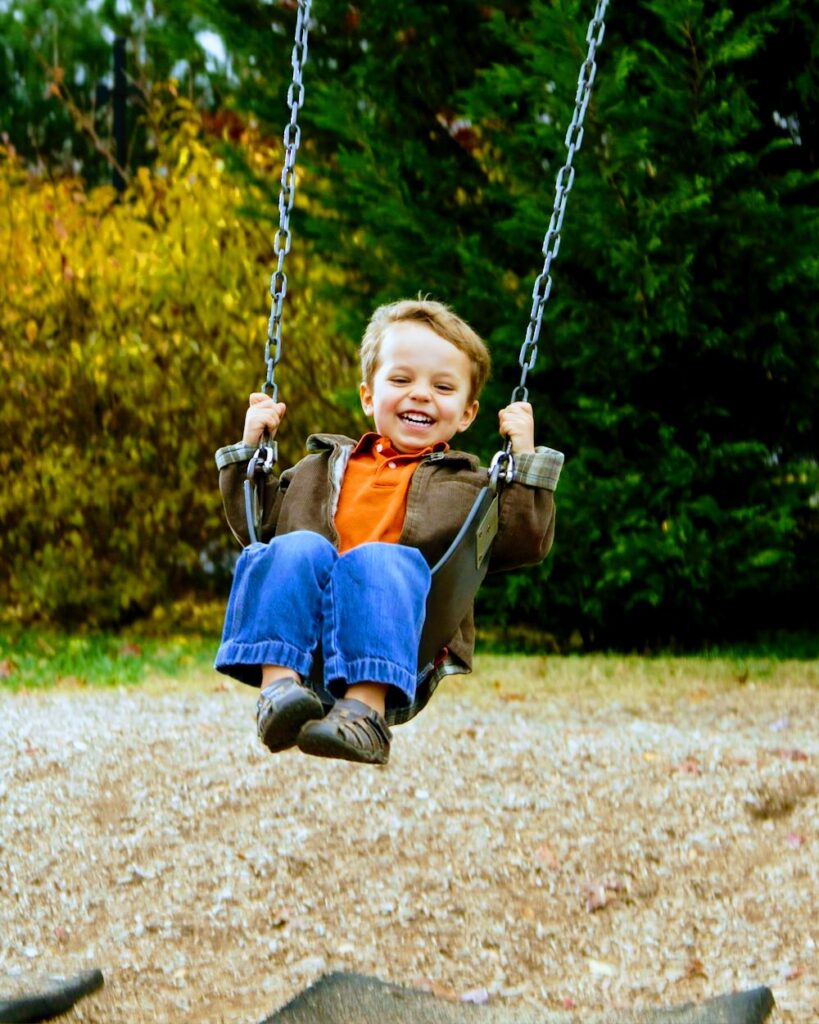 Autism and swinging.  An autistic child swinging.